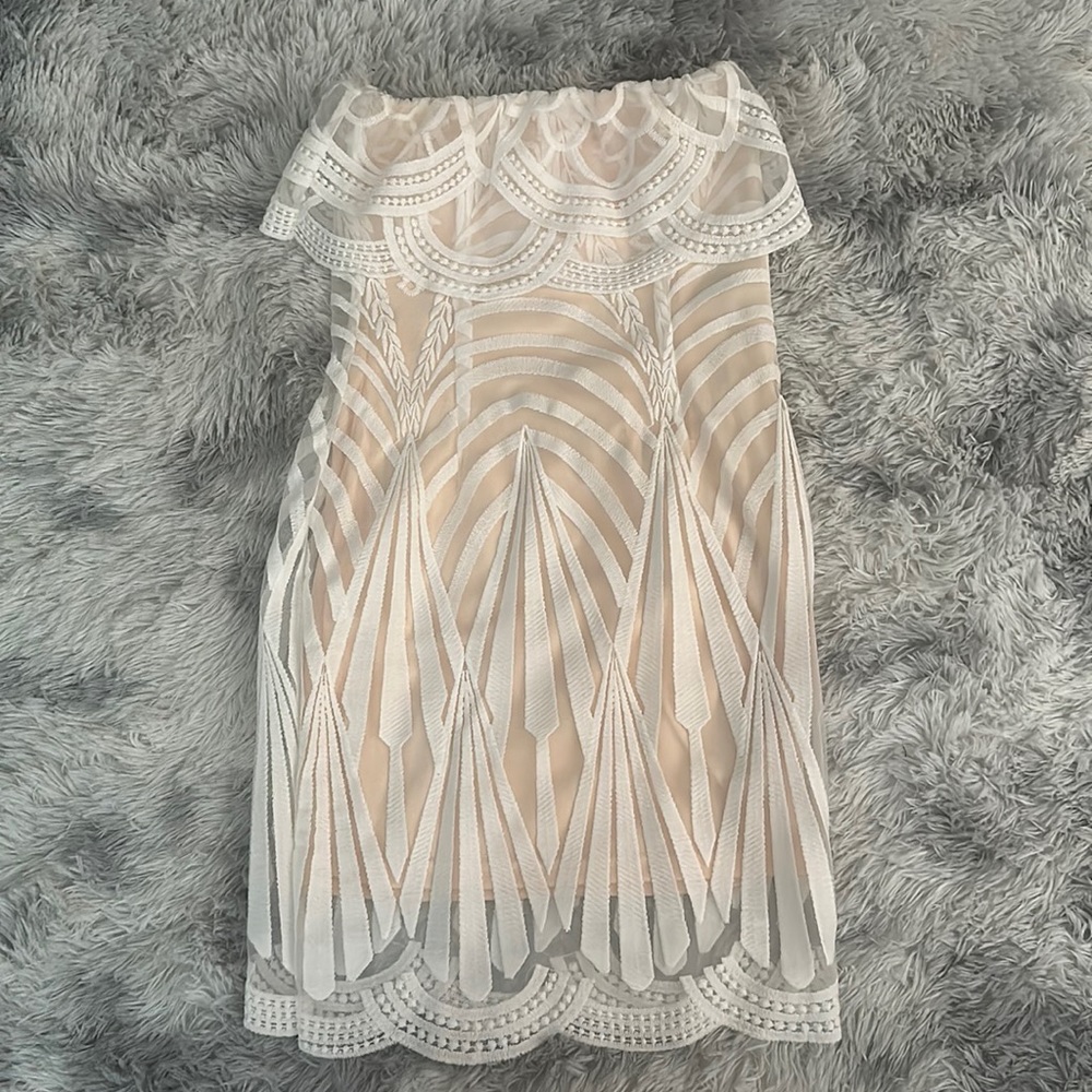White an cream colored mini dress. Size small. Great condition worn once.